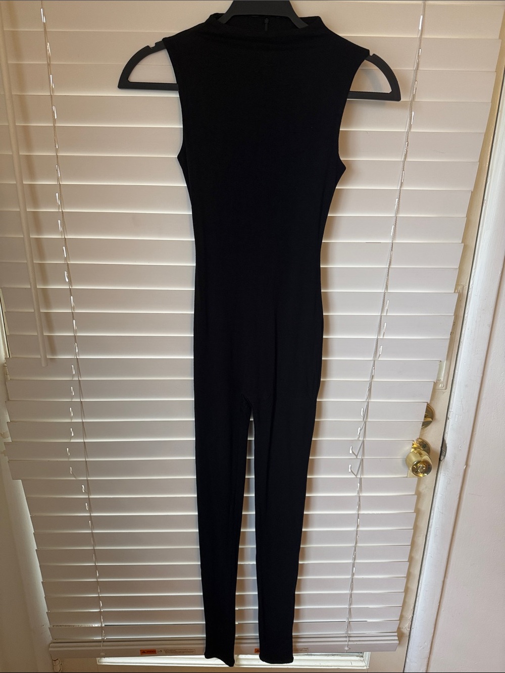 naked wardrobe Black Sleeveless Fitted Jumpsuit
